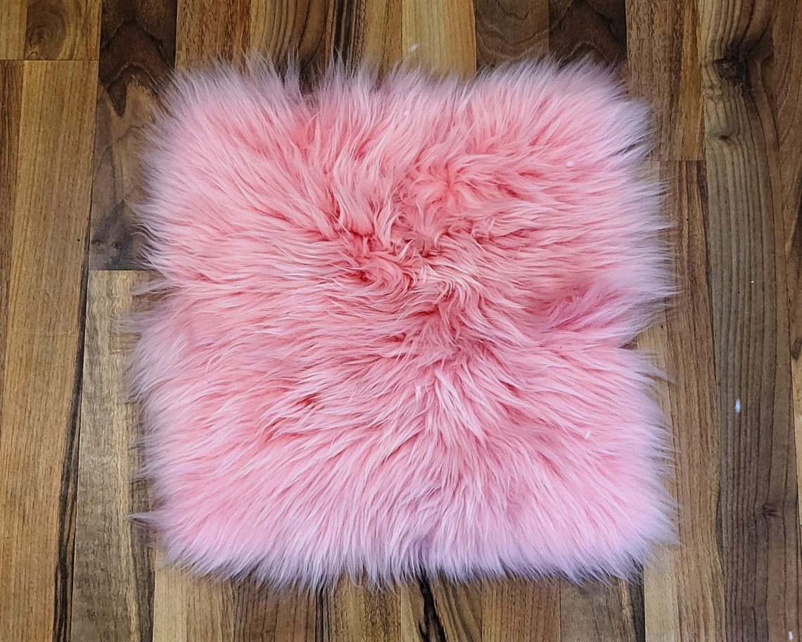 Pink sheepskin seat deals covers